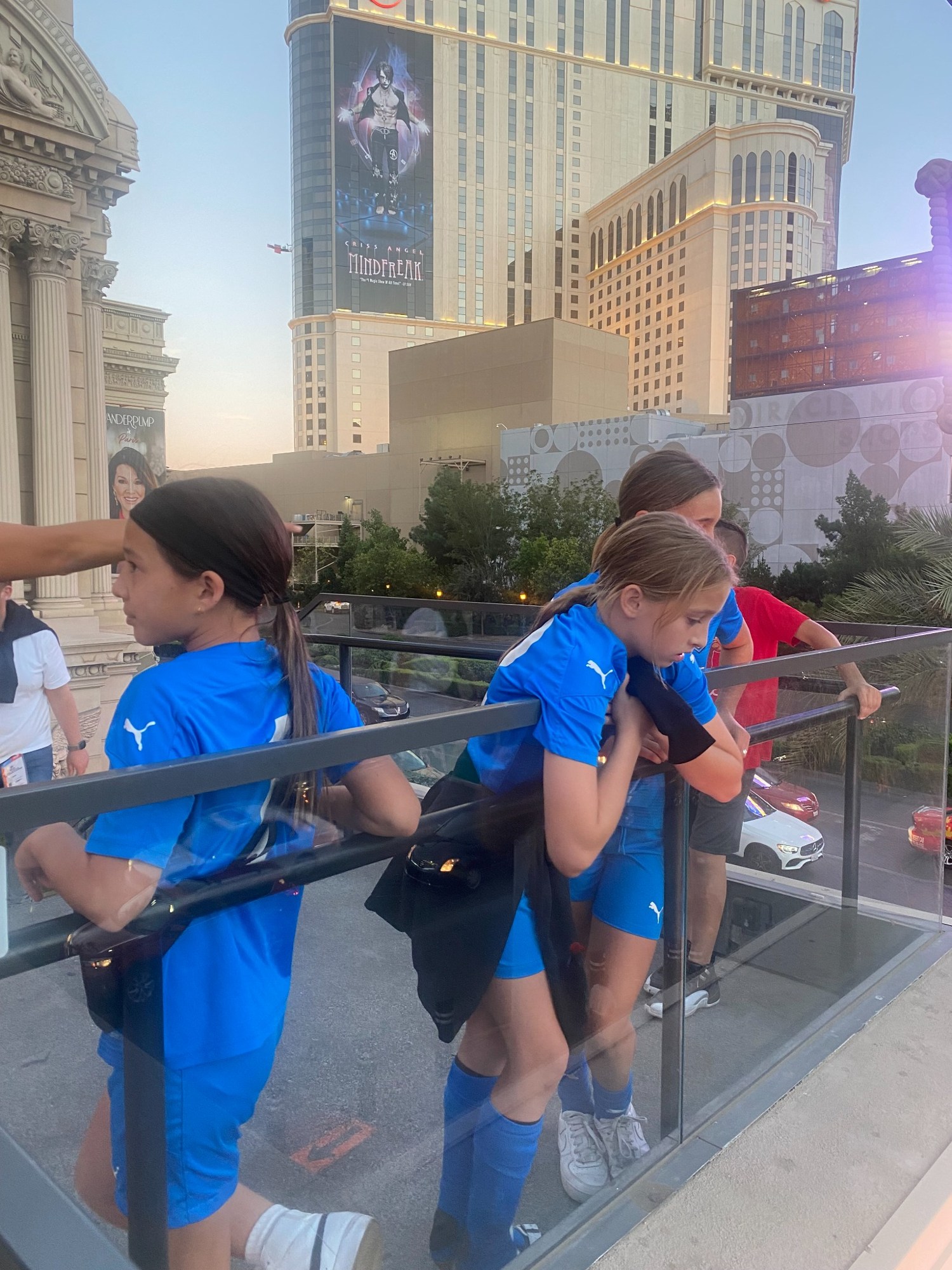 Teammates exploring the city in blue uniforms